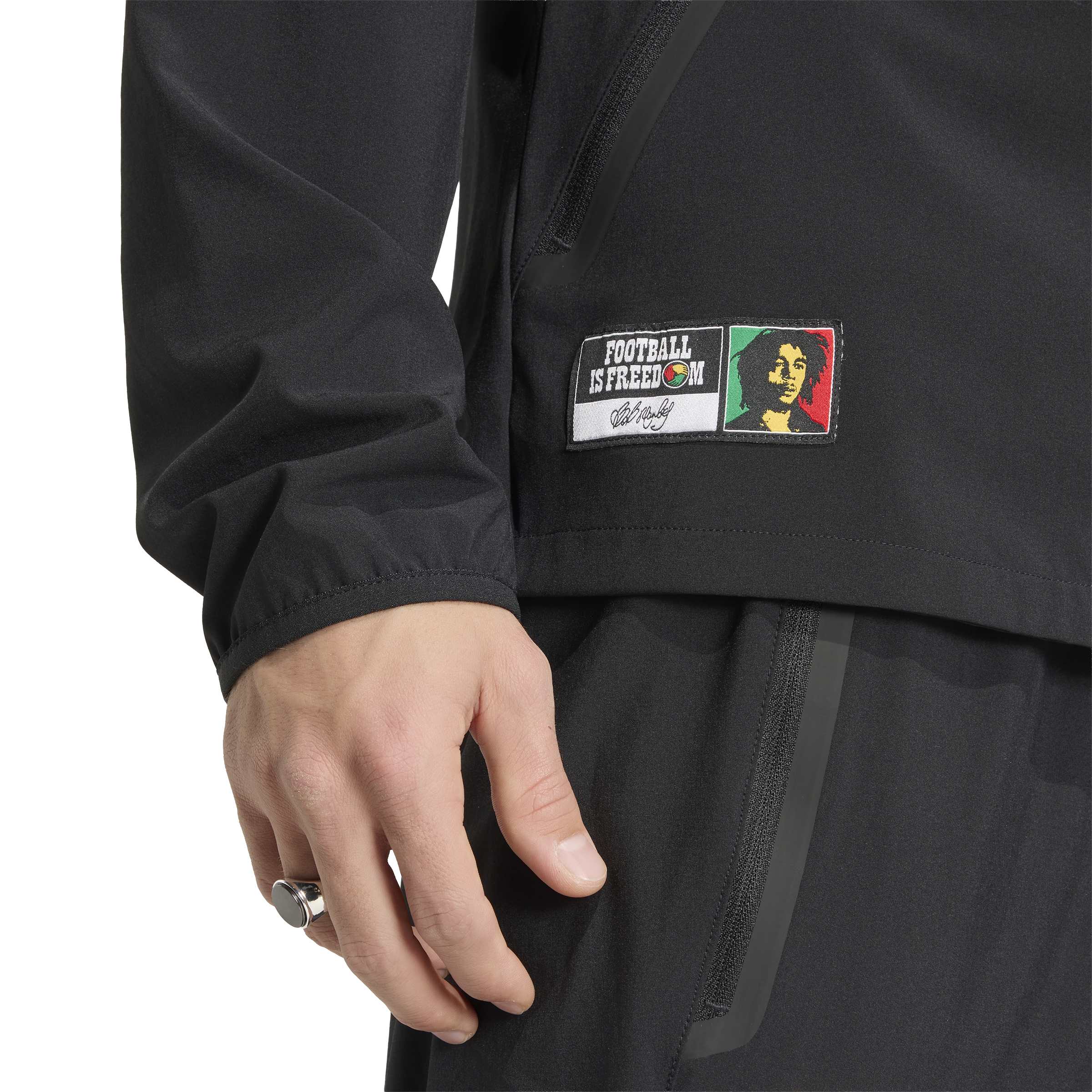 Adidas Jamaica X Bob Marley Tiro Travel Trainingsjack 2026-2028 Zwart Groen Geel Rood Adidas Jamaica X Bob Marley Tiro Travel Trainingspak Full-Zip 2026-2028 Zwart Groen Geel Rood - foto 5
