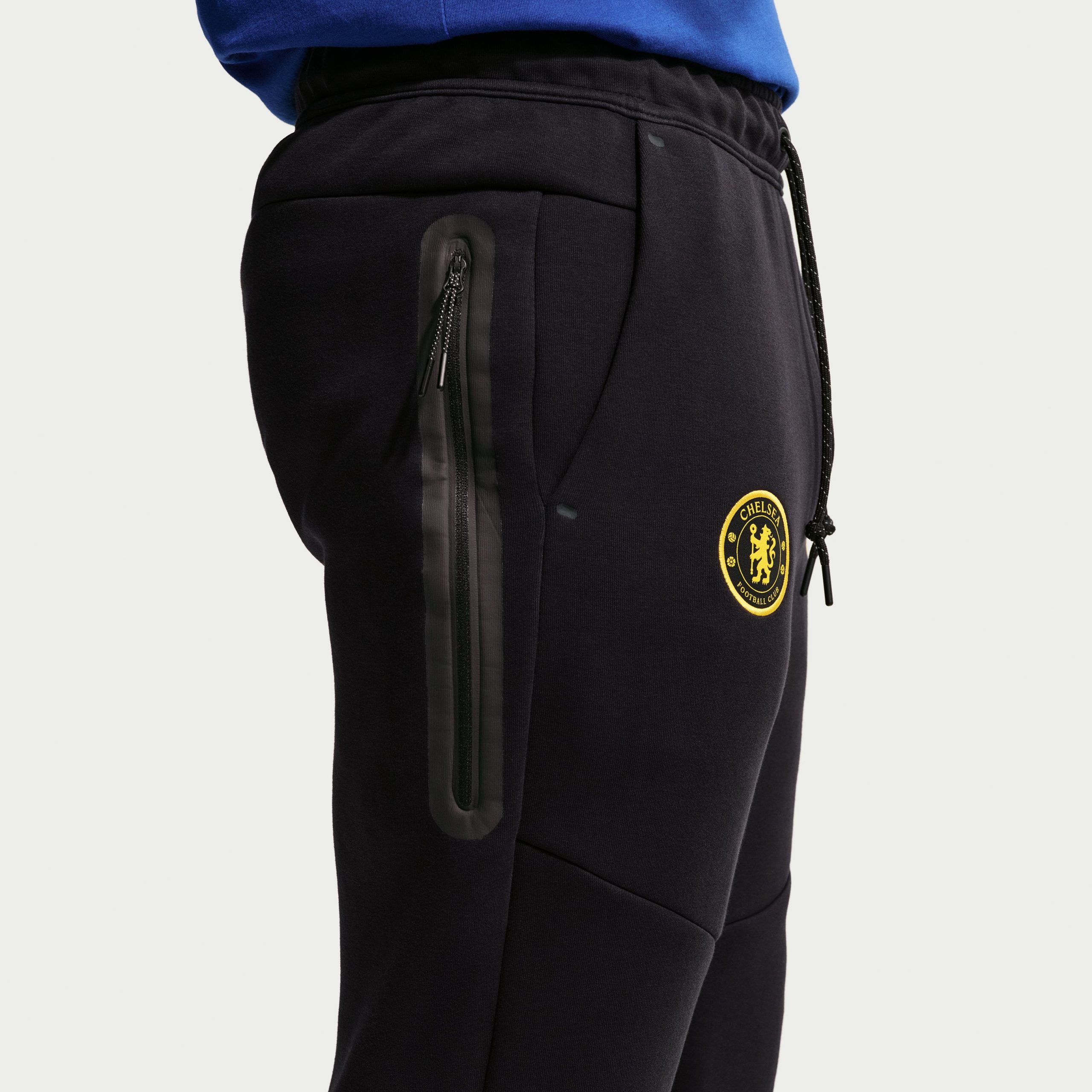 Nike Chelsea Tech Fleece Joggingbroek 2026-2027 Zwart Goudgeel Nike Chelsea Tech Fleece Trainingspak 2026-2027 Zwart Goudgeel - foto 7