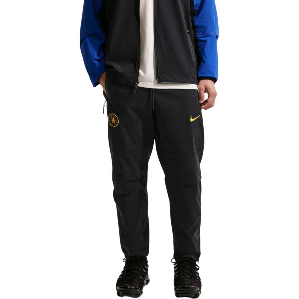 Nike Chelsea Tech Woven Trainingsbroek 2026-2027 Donkerblauw Goudgeel Nike Chelsea Tech Woven Trainingspak 2026-2027 Blauw Donkerblauw Goudgeel - foto 7