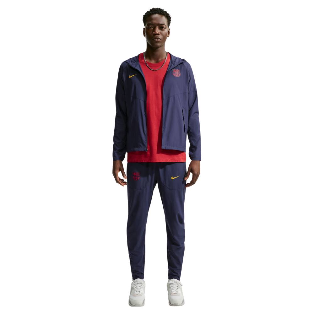 Nike FC Barcelona City Side Trainingsjack 2026-2027 Donkerblauw Goudgeel Roze Nike FC Barcelona City Side Trainingspak 2026-2027 Donkerblauw Goudgeel Roze
