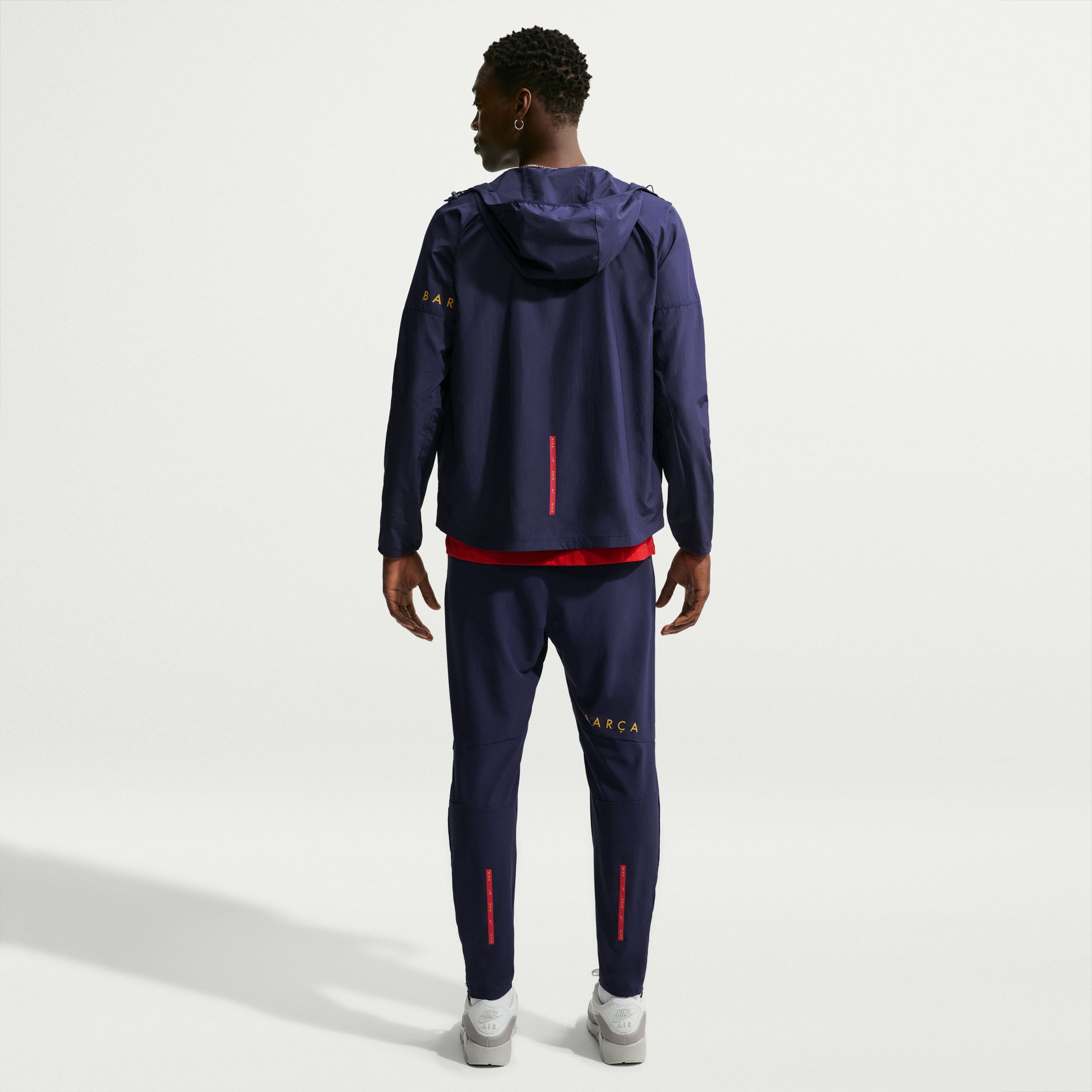 Nike FC Barcelona City Side Trainingsjack 2026-2027 Donkerblauw Goudgeel Roze Nike FC Barcelona City Side Trainingspak 2026-2027 Donkerblauw Goudgeel Roze - foto 2