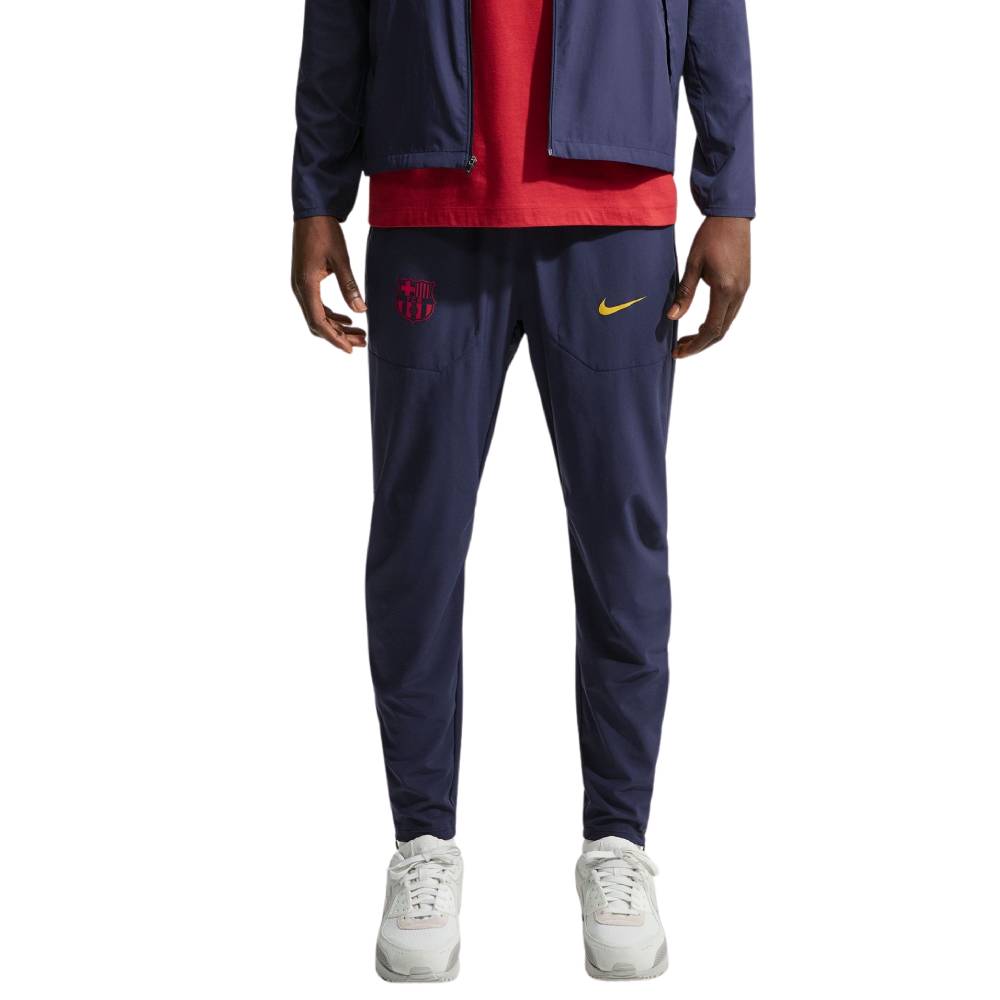 Nike FC Barcelona City Side Trainingsbroek 2026-2027 Donkerblauw Goudgeel Roze Nike FC Barcelona City Side Trainingsbroek 2026-2027 Donkerblauw Goudgeel Roze